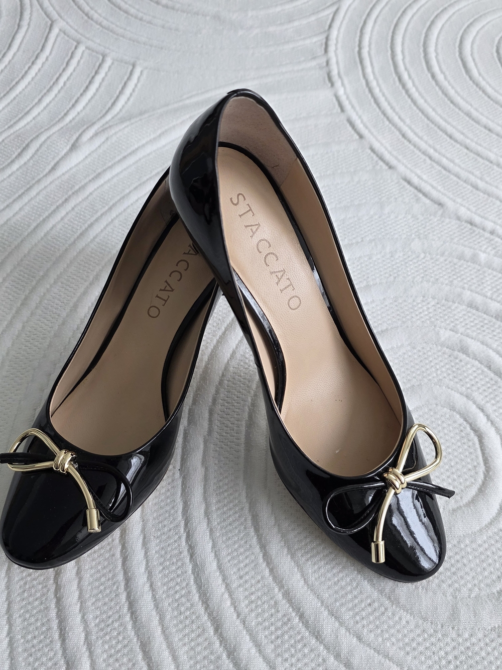Staccato Black Patent Pumps with Gold Bow